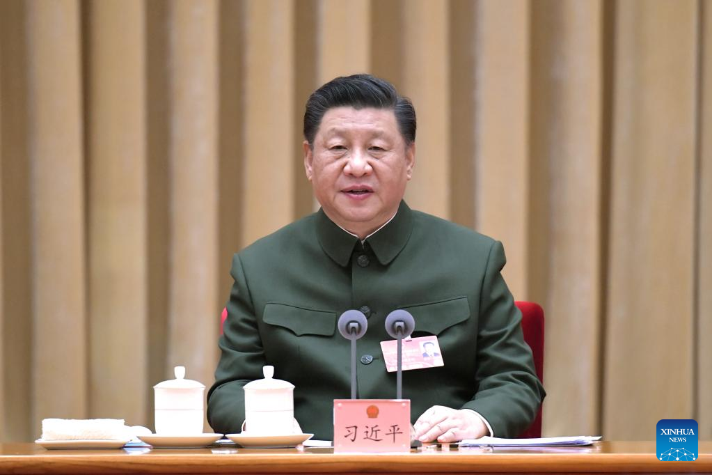 Xi stresses running military in accordance with law