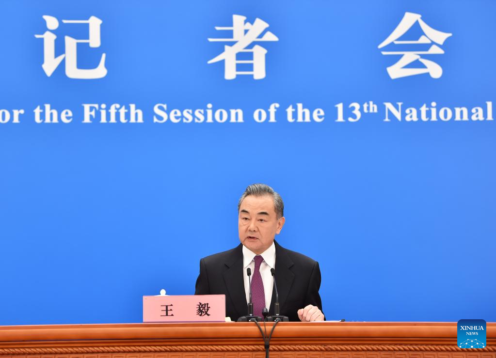 Chinese FM meets press on foreign policy, relations