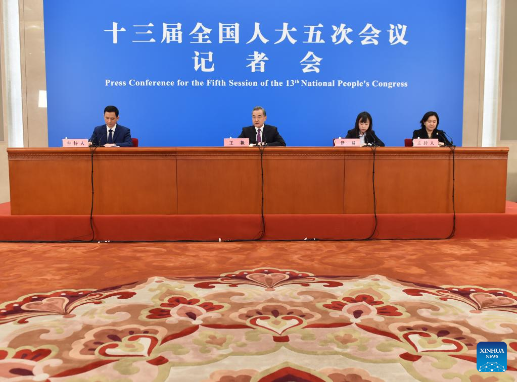 Chinese FM meets press on foreign policy, relations