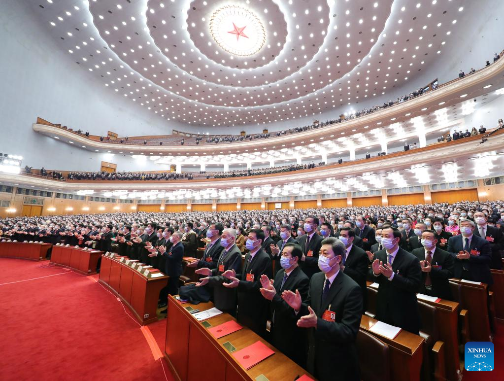 China's national legislature holds closing meeting of annual session