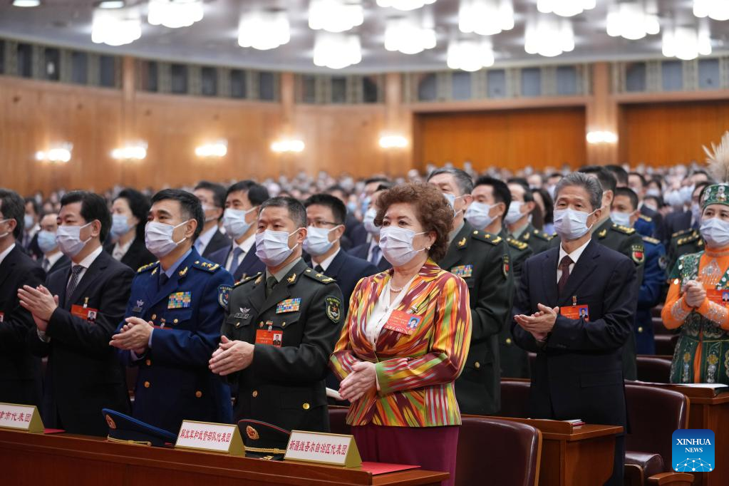 China's national legislature holds closing meeting of annual session