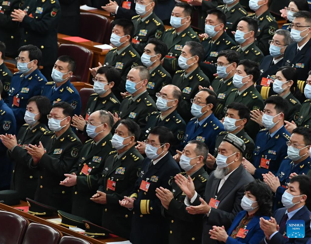 China's national legislature holds closing meeting of annual session