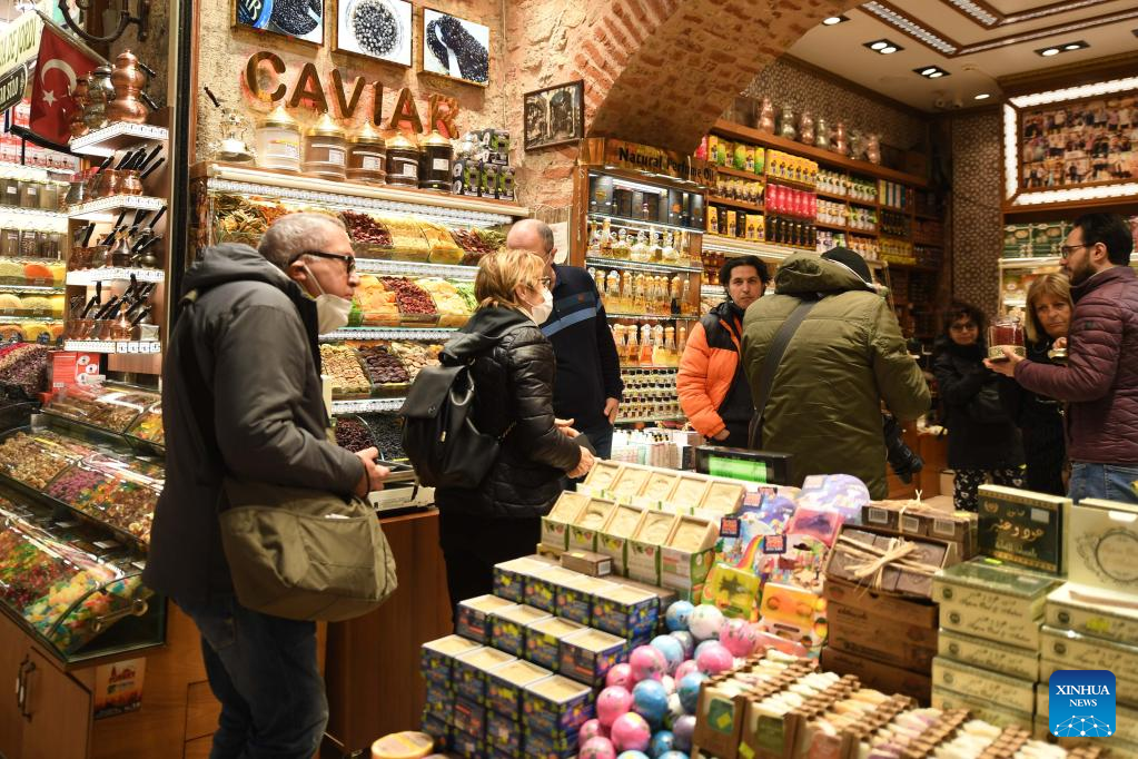 People shop at historical bazaars in Istanbul