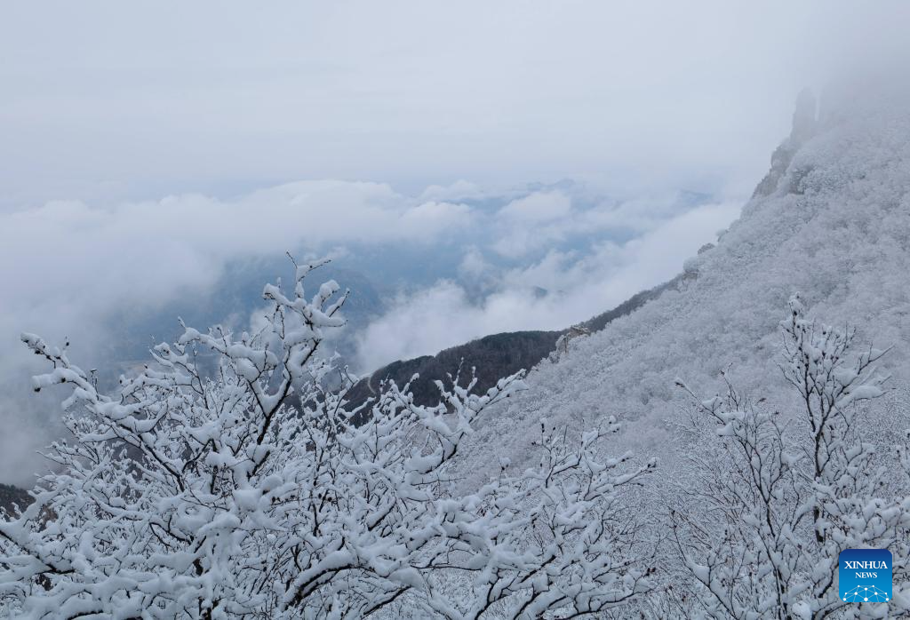 Baishi Mountain covered in snow in Laiyuan County, N China