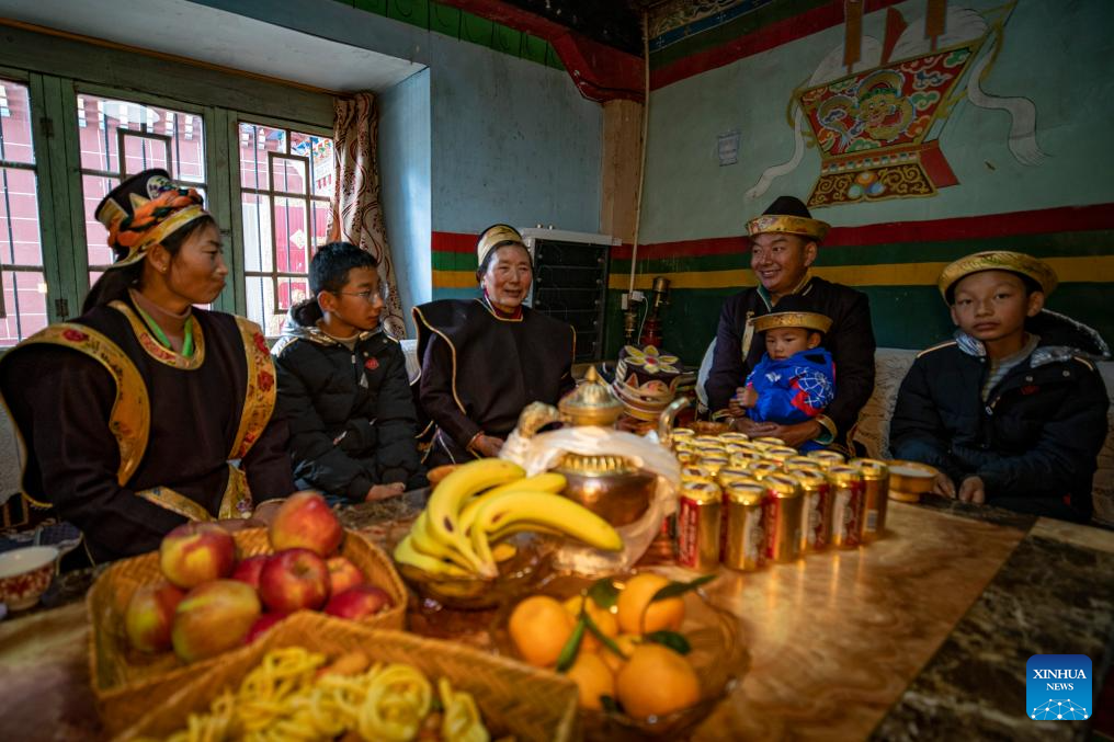 Family celebrates Gongbo New Year in Suosong Village, Xizang