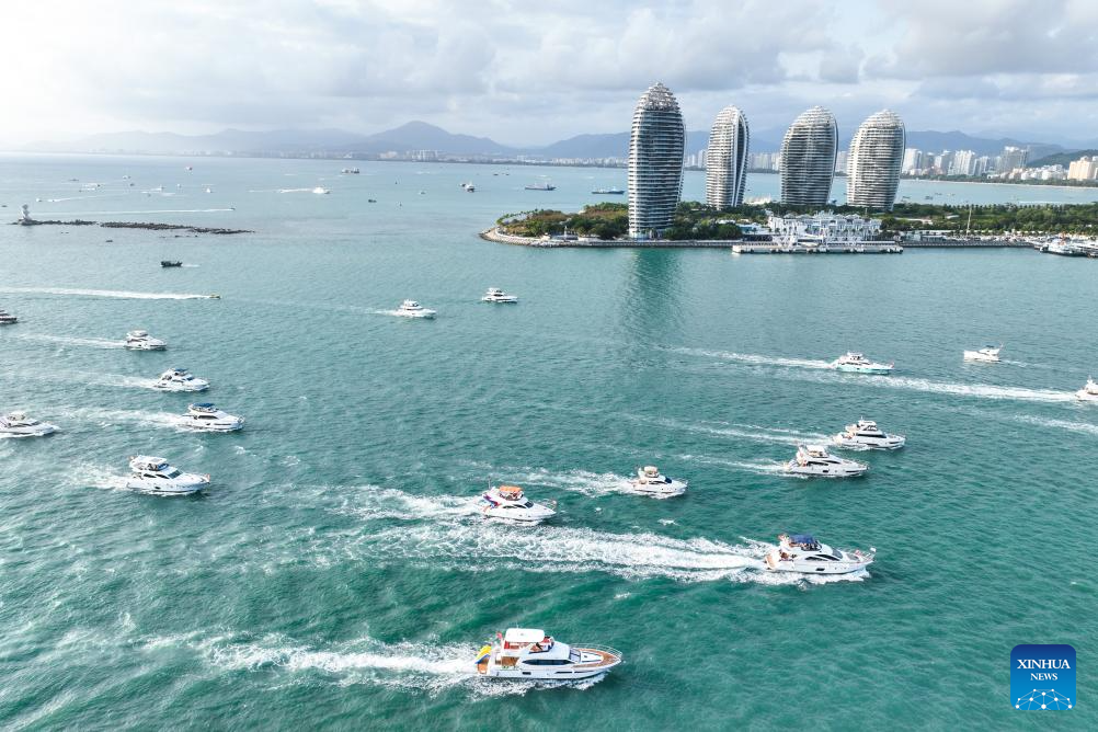 Yachts ride waves in Sanya, China's Hainan