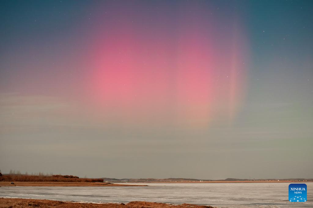 Aurora Borealis illuminates sky above Nehe City in NE China