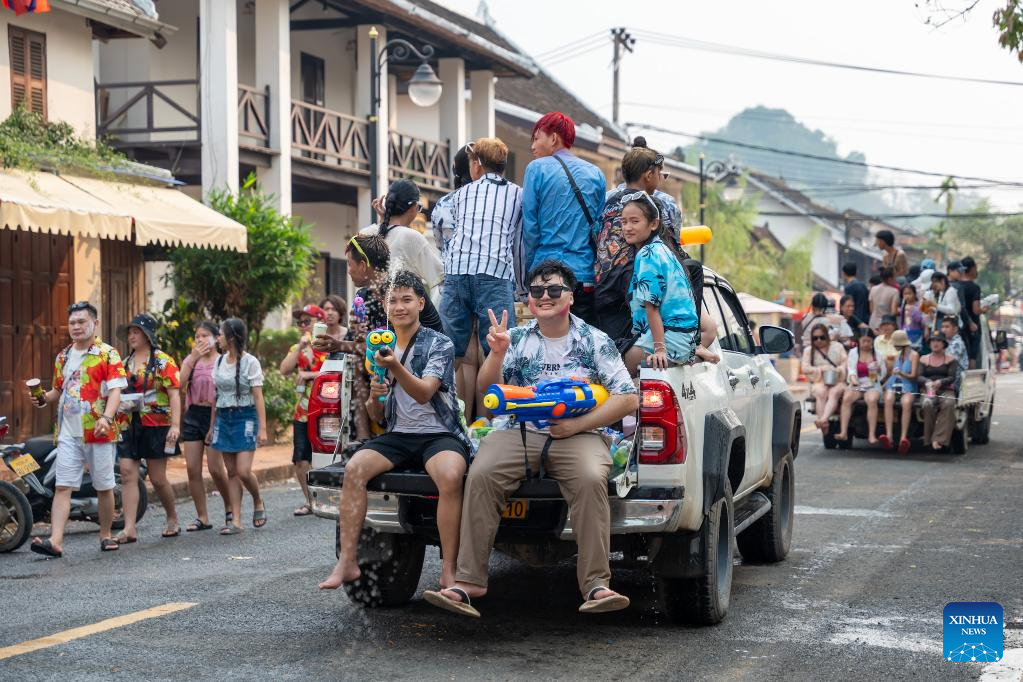 People celebrate Songkran Festival in Laos