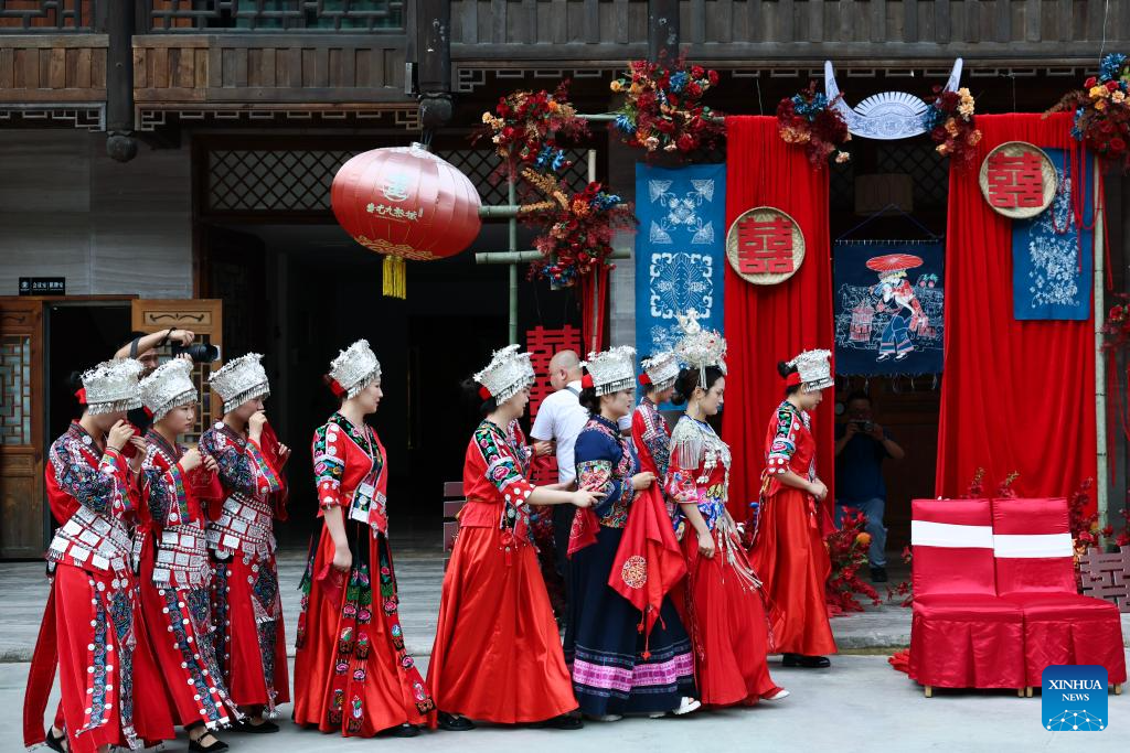 Local authorities in SW China leverage ethnic features to boost summer tourism