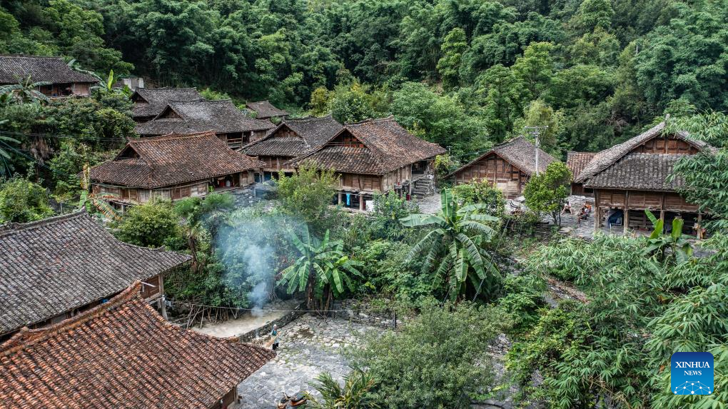 SW China's Tianmen Village features original landscape, traditional folk activities