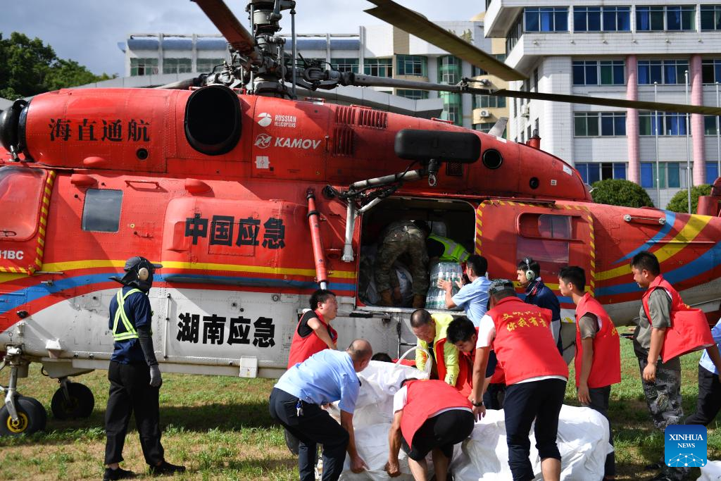 People stranded in waterlogged residences relocated in C China's Hunan