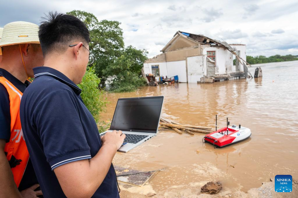 Over 3,800 evacuated after dike breach in central China