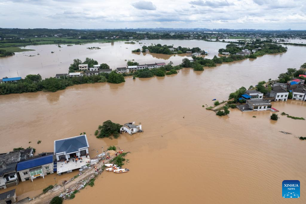 Over 3,800 evacuated after dike breach in central China