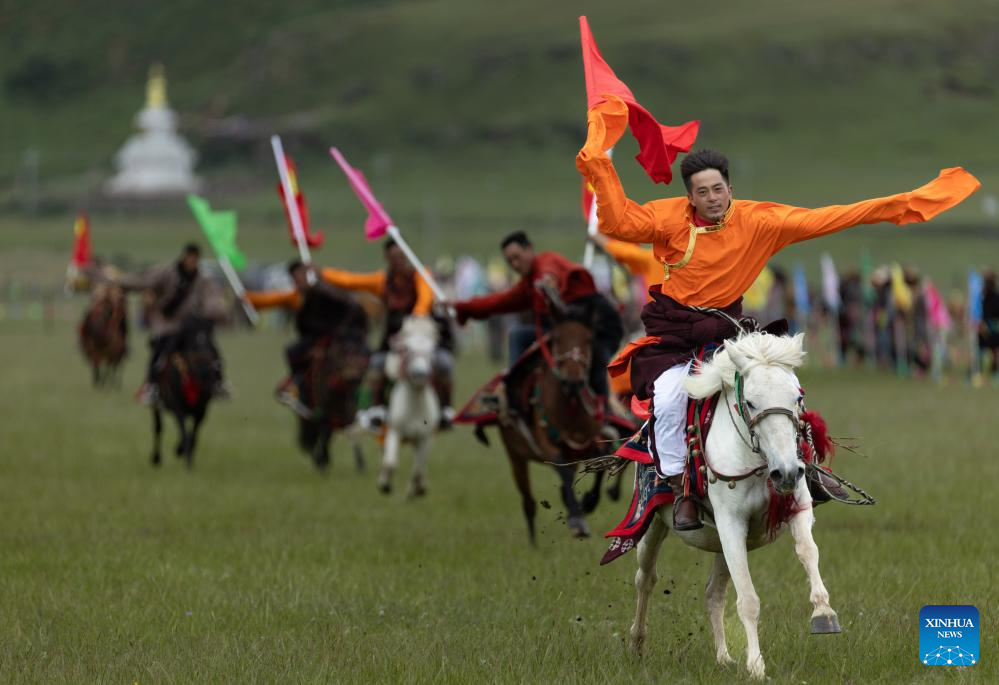 Rural folk event held in Baiyu County, SW China