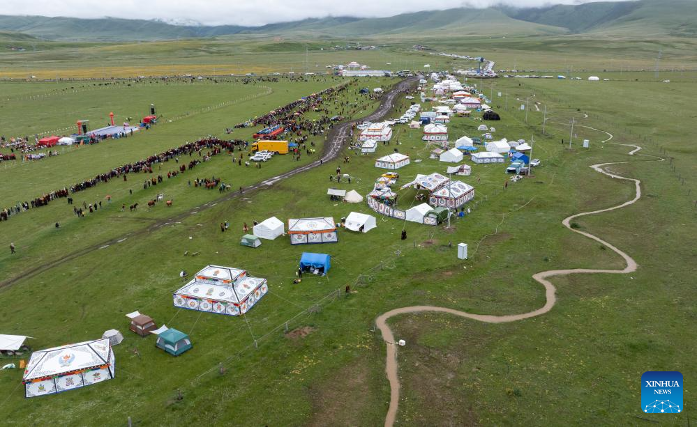 Rural folk event held in Baiyu County, SW China