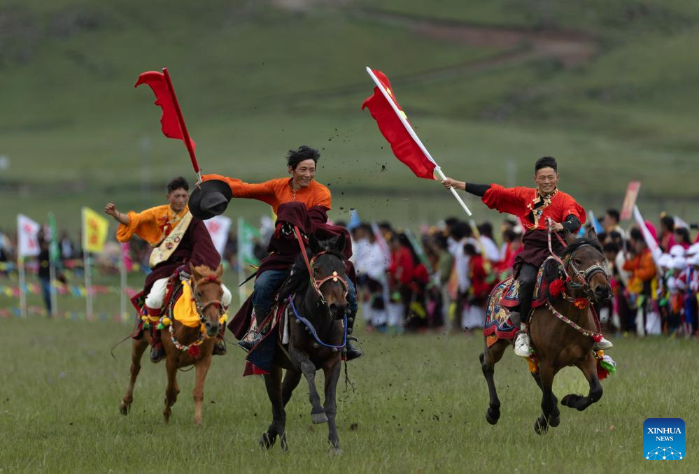 Rural folk event held in Baiyu County, SW China