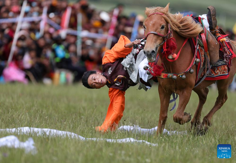 Rural folk event held in Baiyu County, SW China