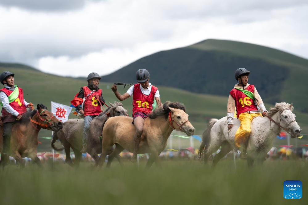 Rural folk event held in Baiyu County, SW China