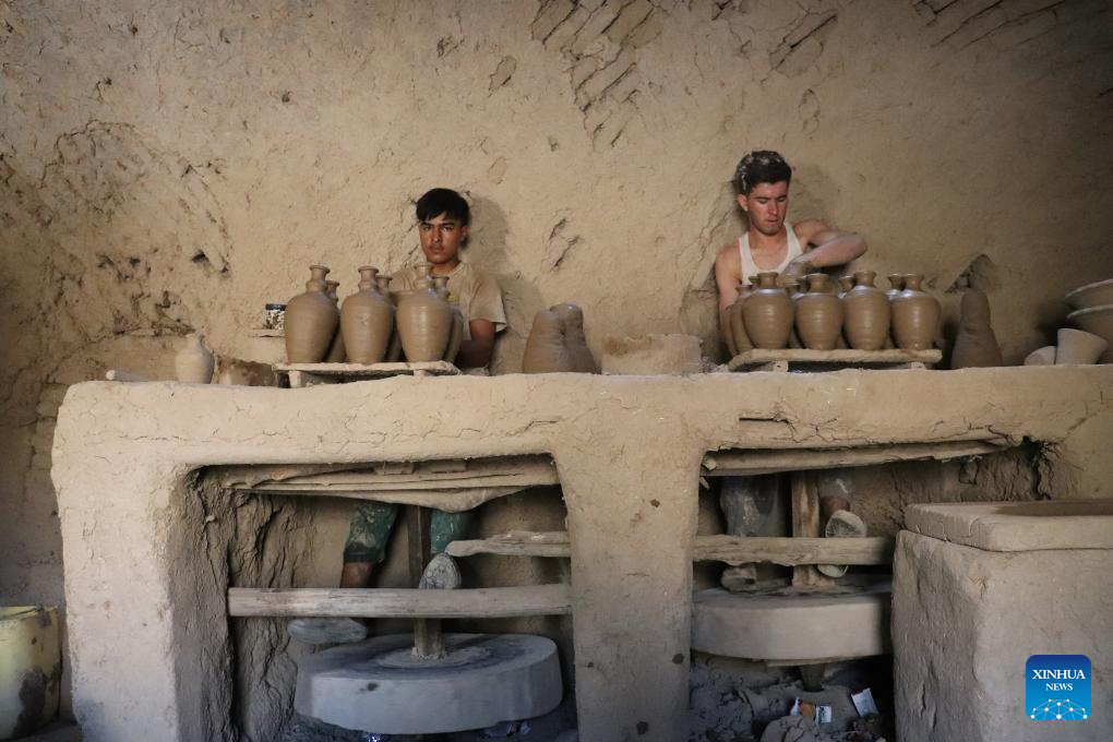 Potters make potteries in Dawlat Abad District, Afghanistan