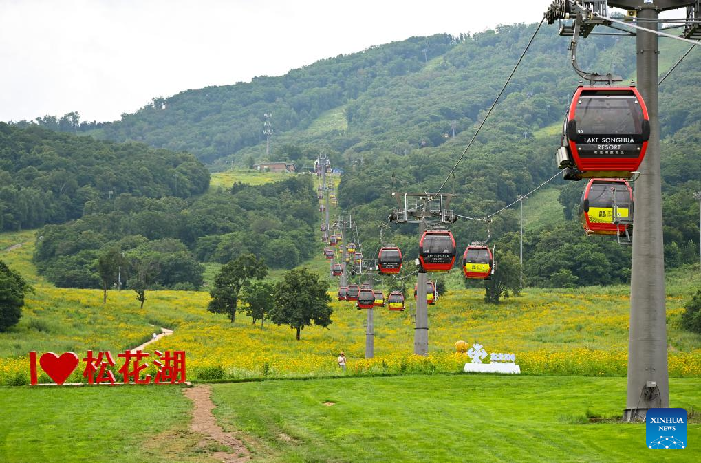 Tourists enjoy summer at ski resorts in Jilin, NE China