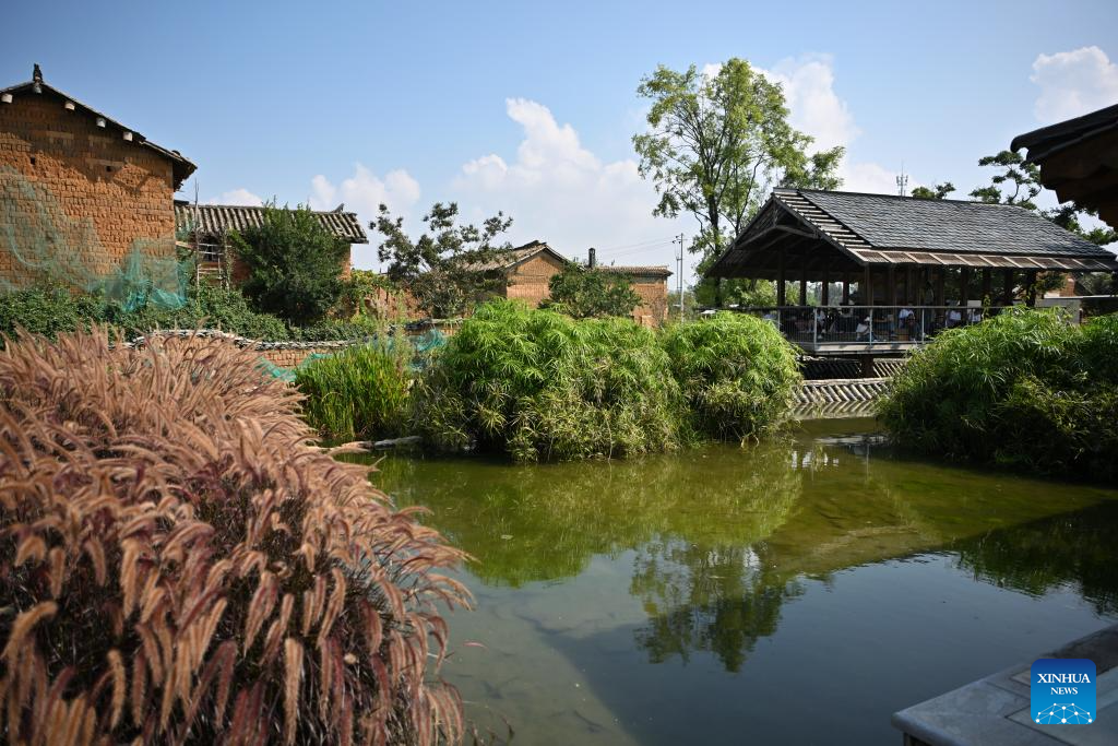 Wolong ancient village showcases restoration and ecotourism efforts in Yunnan