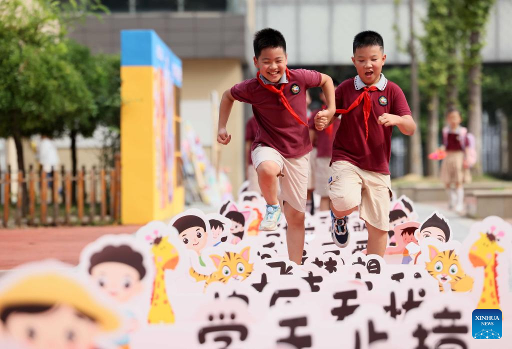 Schools across China host activities to mark start of new semester