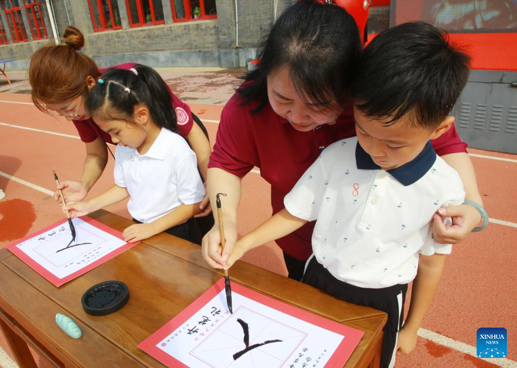 Schools across China host activities to mark start of new semester