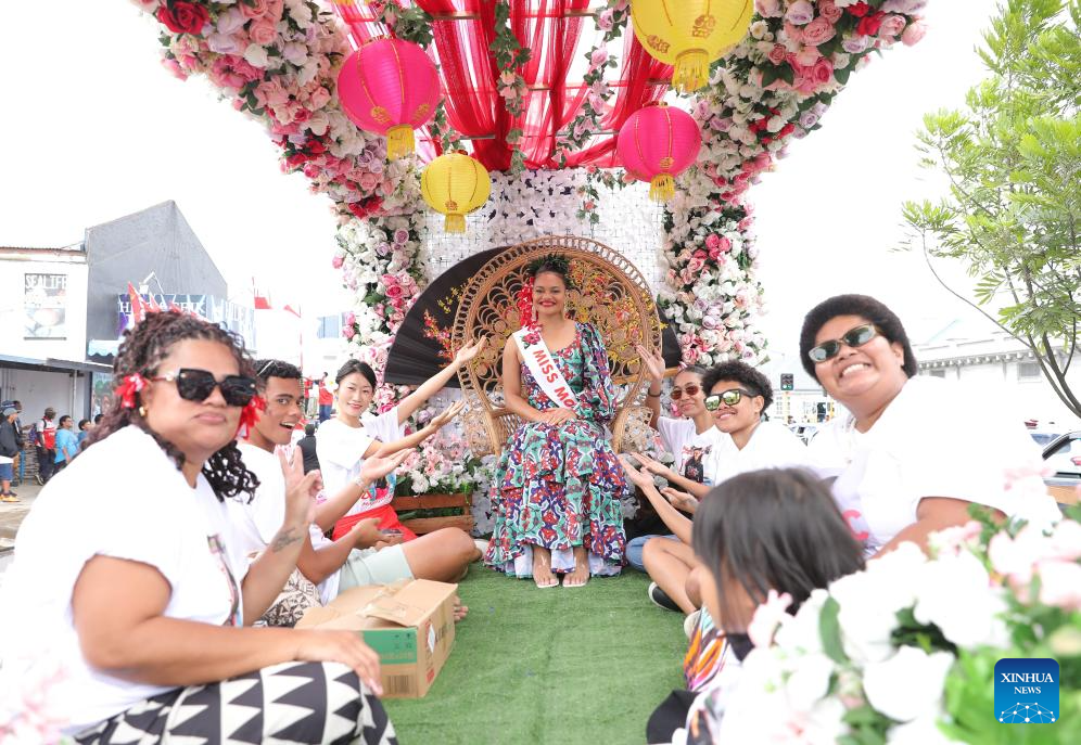 People participate in float parade in celebration of Hibiscus Festival in Fiji