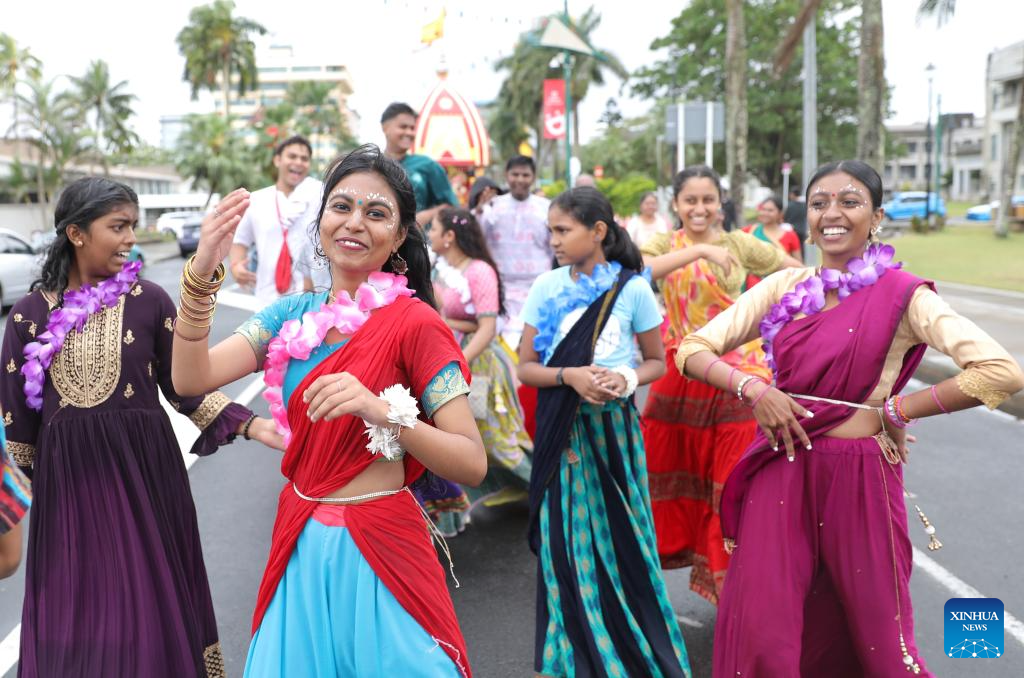 People participate in float parade in celebration of Hibiscus Festival in Fiji