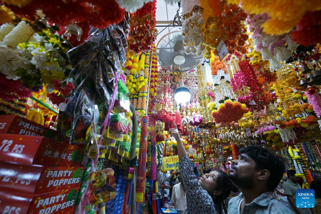 People shop for upcoming Hindu festival Deepavali in Singapore