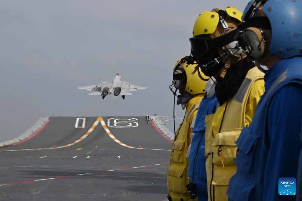 Chinese navy conducts dual aircraft carrier formation exercise for first time