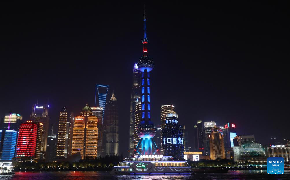 Landmarks lit up to welcome 7th CIIE in Shanghai