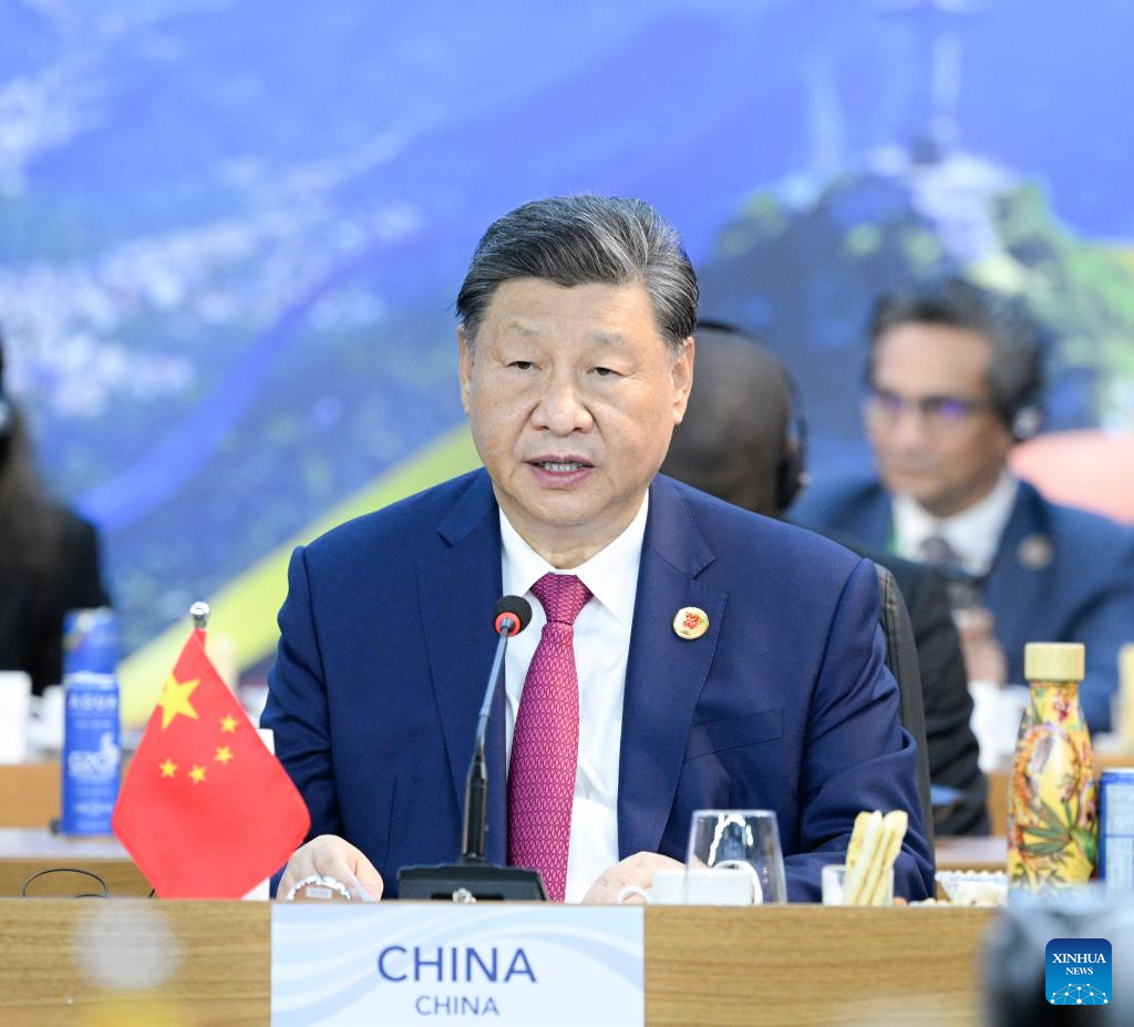 Xi calls for building just world of common development, outlines China's actions for global development