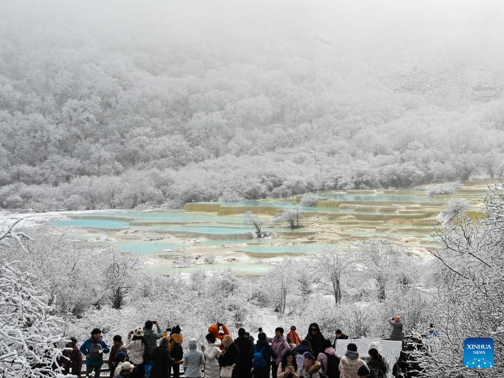 Scenery of colorful pond cluster at Huanglong scenic area in China's Sichuan