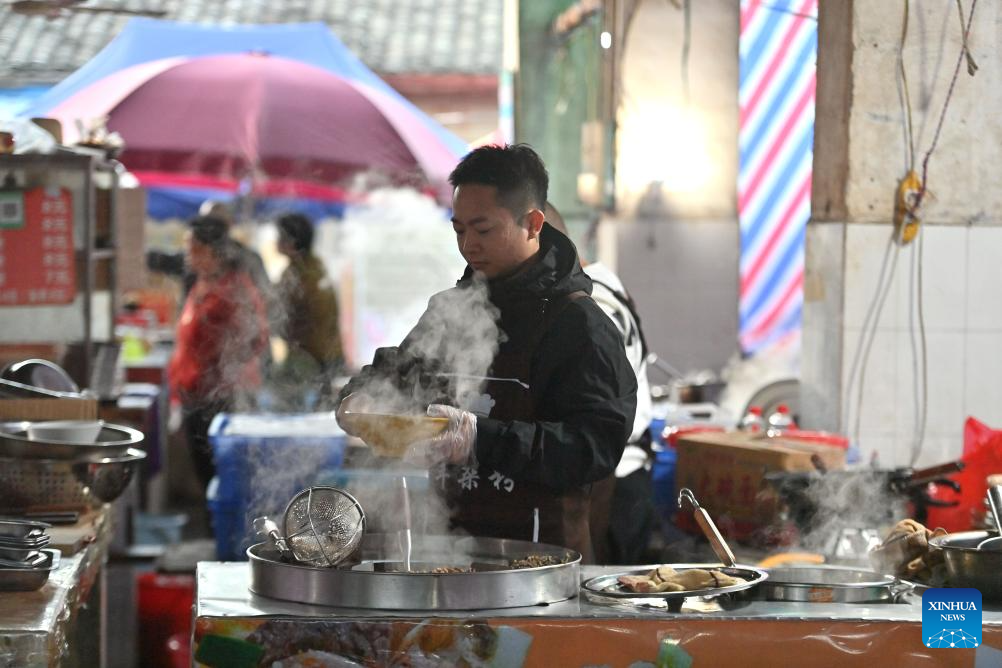 In pics: morning market in Chengtuan Town of Liuzhou, S China's Guangxi