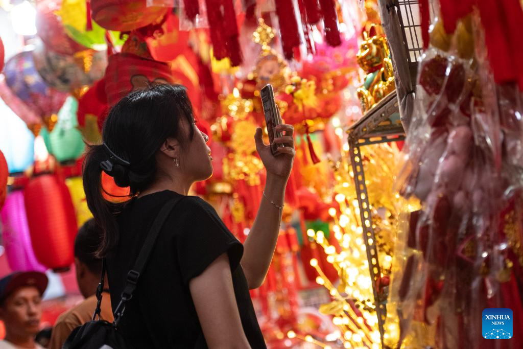 People choose Chinese New Year decorations in Jakarta