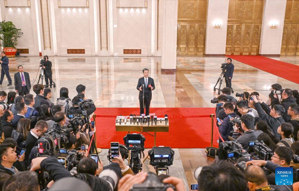 Ministers give interviews after NPC opening meeting