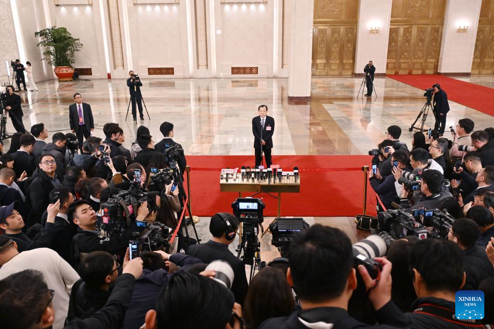 Ministers give interviews after NPC opening meeting