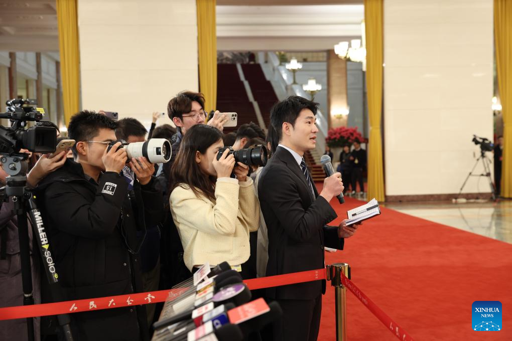 Ministers give interviews after NPC opening meeting
