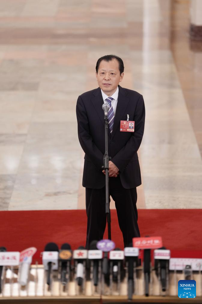 Ministers give interviews after NPC opening meeting