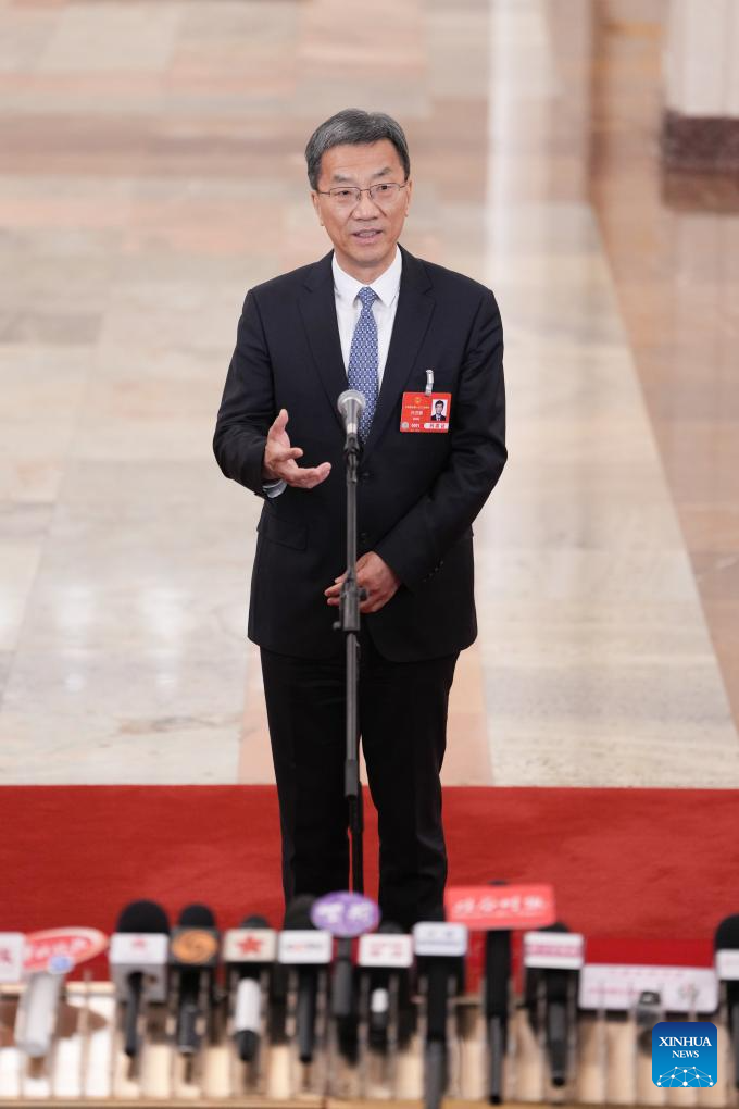 Ministers give interviews after NPC opening meeting