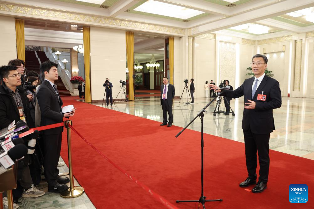 Ministers give interviews after NPC opening meeting