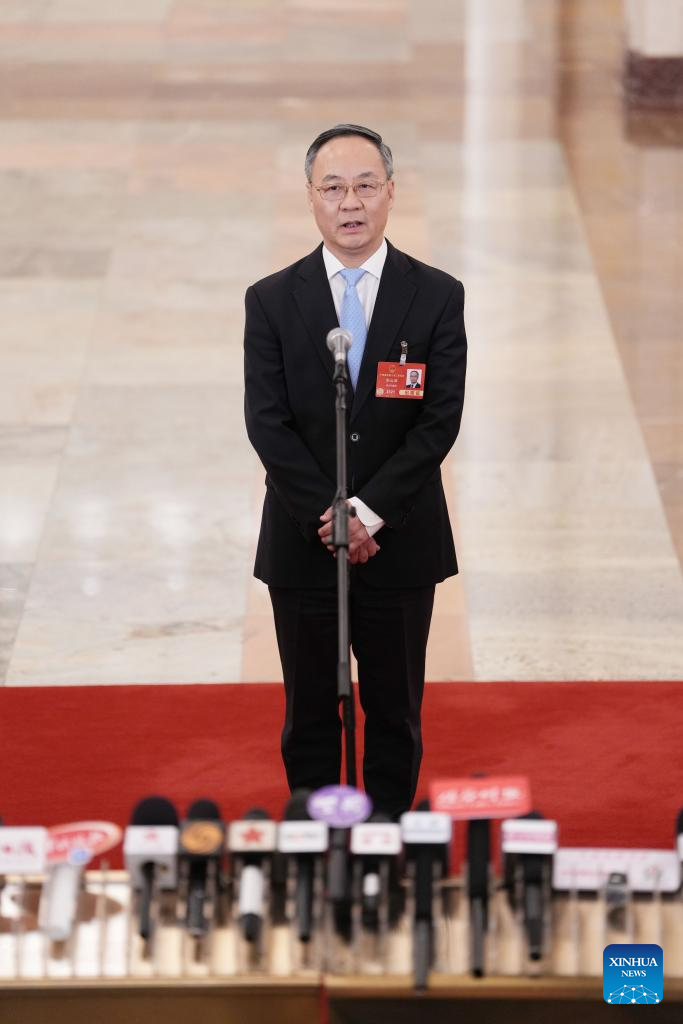 Ministers give interviews after NPC opening meeting