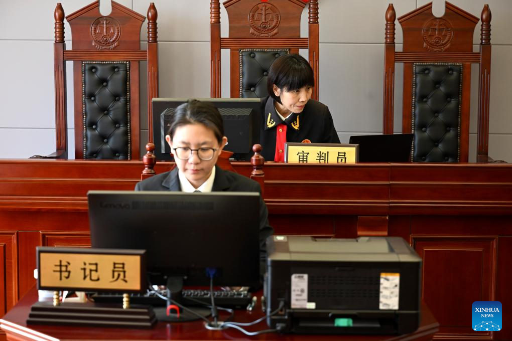 Female judges perform their daily duties in Beijing