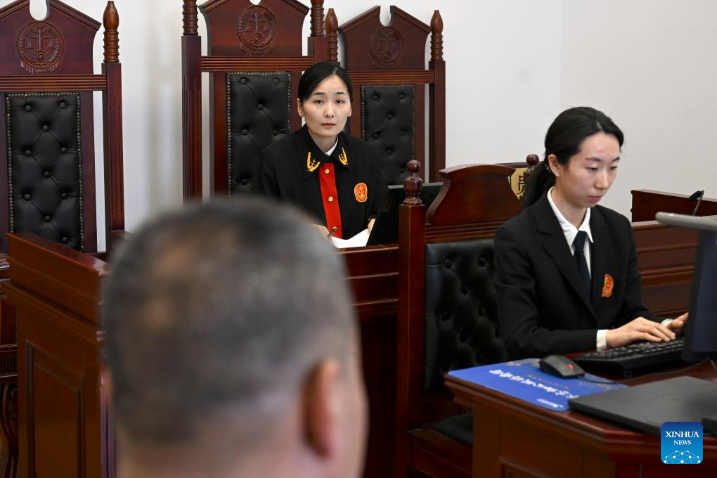 Female judges perform their daily duties in Beijing