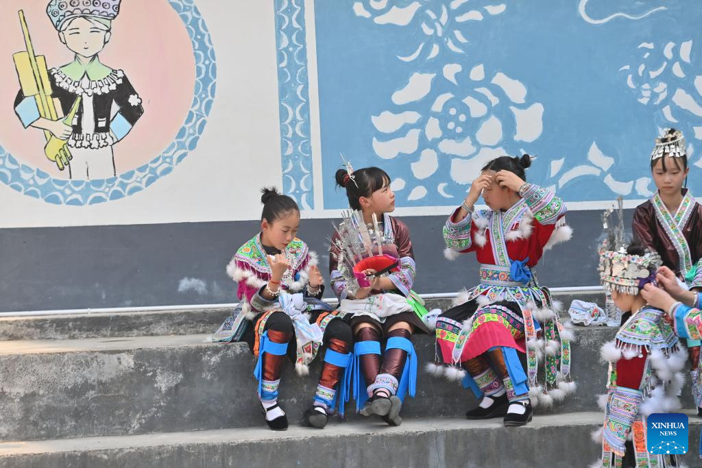 Celebration held before Sanyuesan Festival at primary school in China's Guangxi