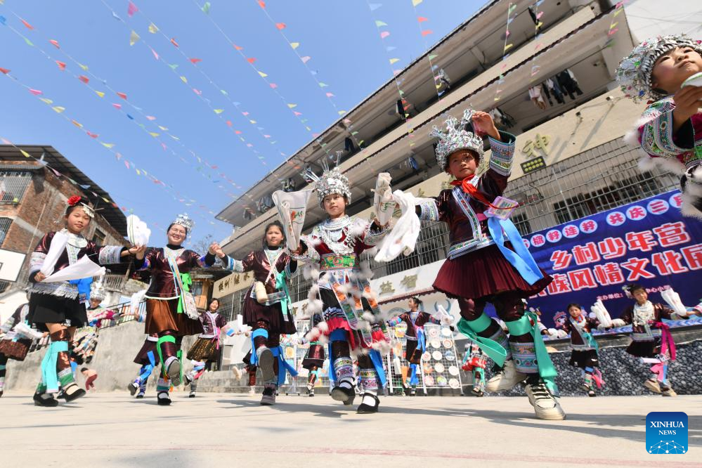 Celebration held before Sanyuesan Festival at primary school in China's Guangxi