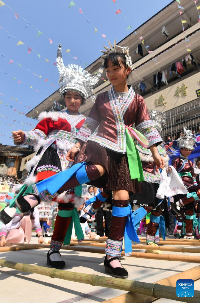 Celebration held before Sanyuesan Festival at primary school in China's Guangxi