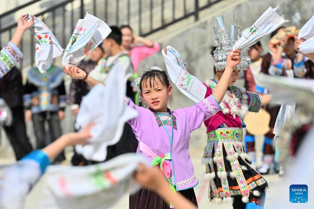 Celebration held before Sanyuesan Festival at primary school in China's Guangxi