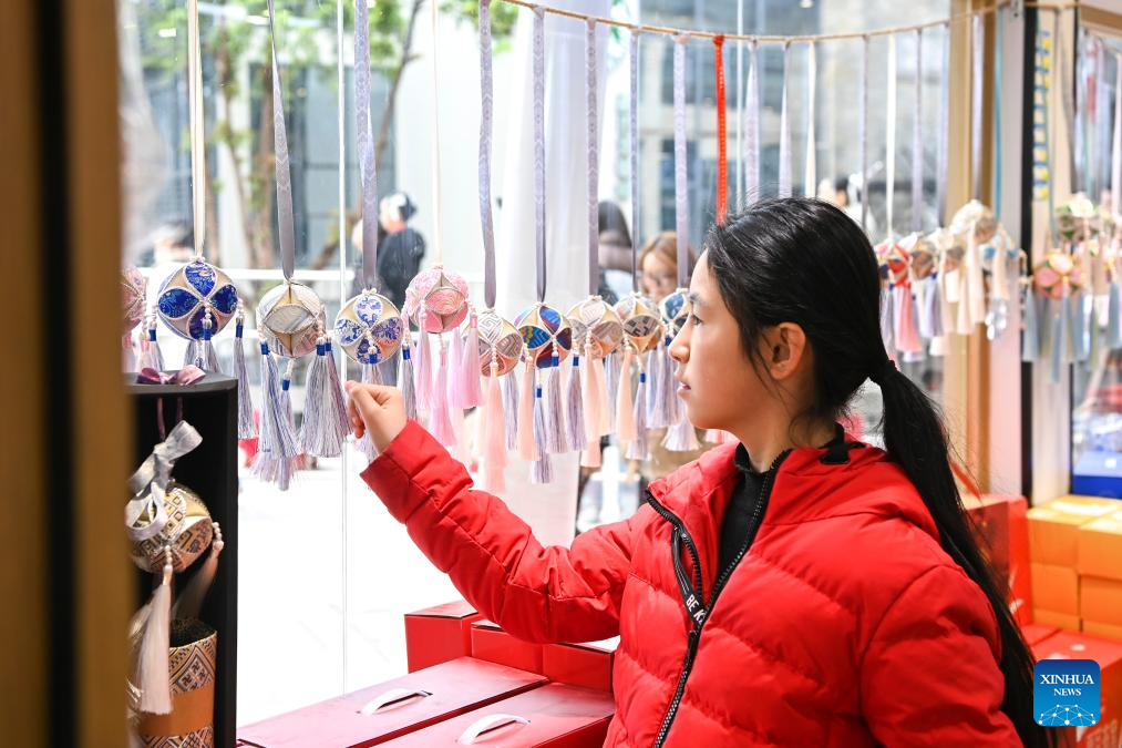 Embroidered balls carry profound folk heritage in China's Guangxi